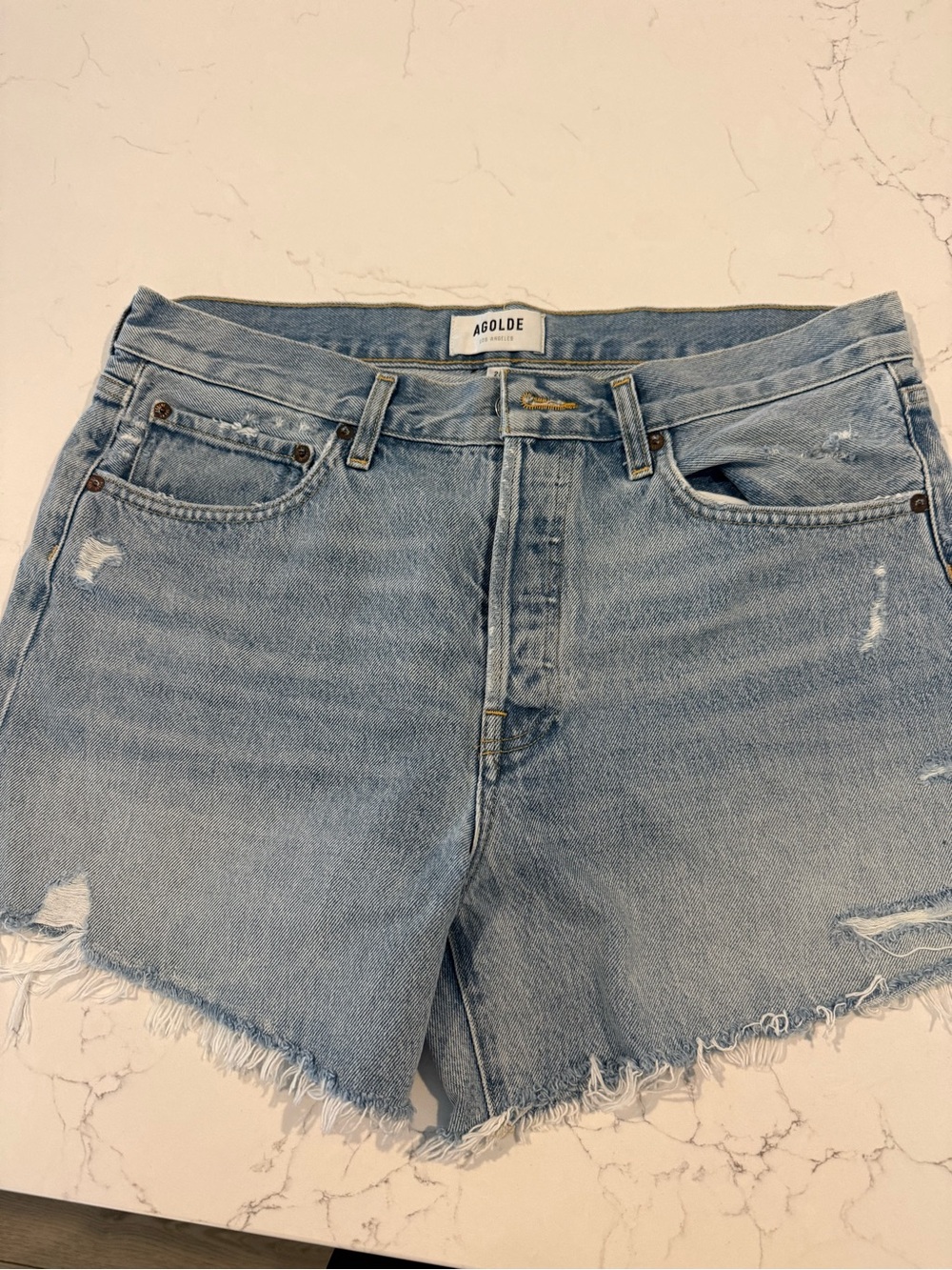 Agolde Light Wash Frayed Hem Denim Shorts